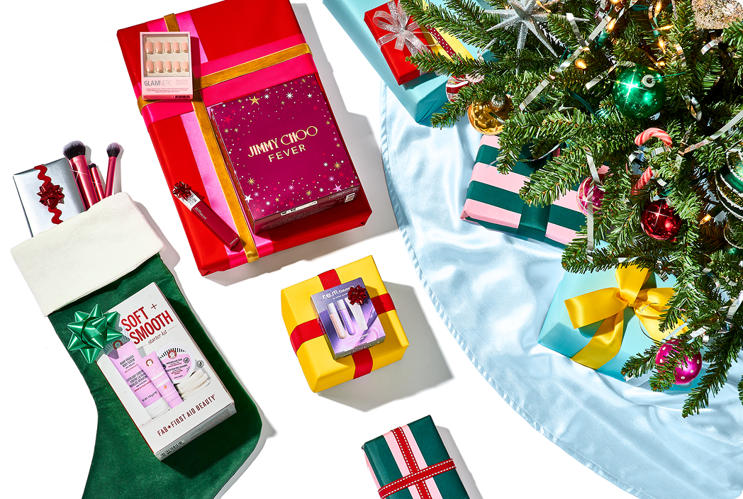 present and a stocking under a Christmas tree