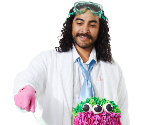 Man with curly dark hair wearing a scientist's outfit