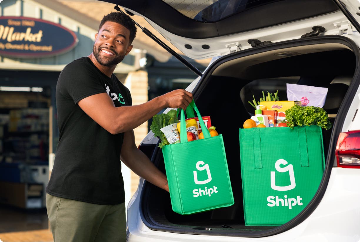 Shopper loading an order to the car