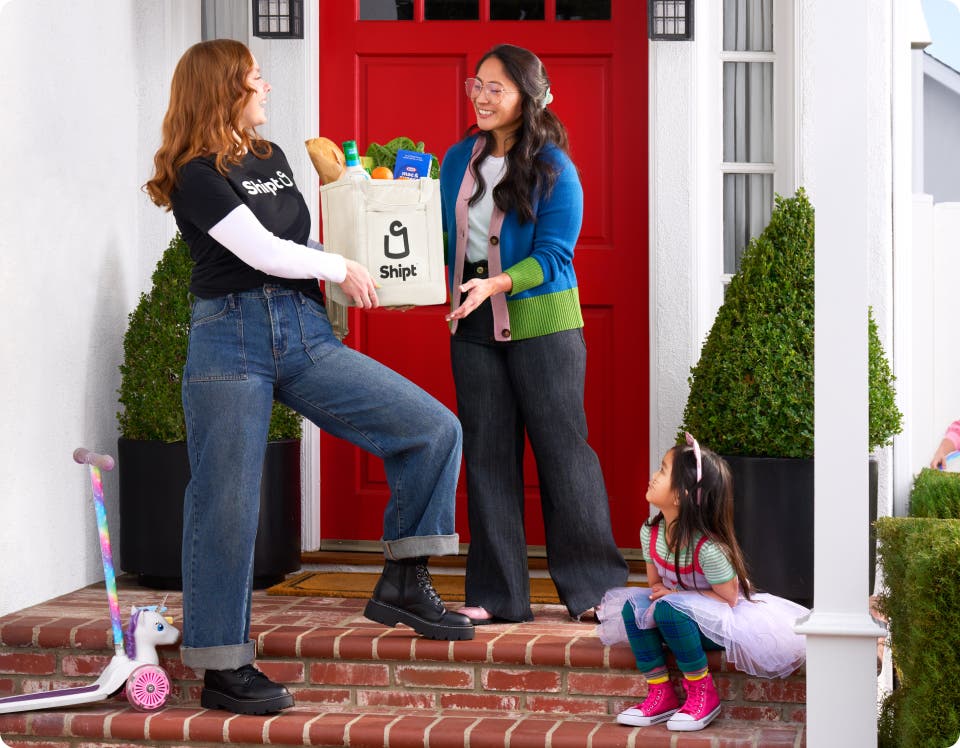 Personal Shopper delivering order to family on door step