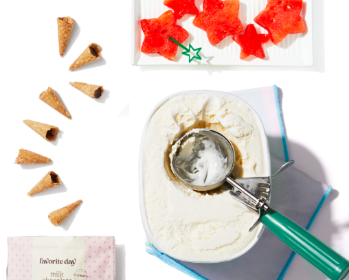 Carton of ice cream with a scoop and cones