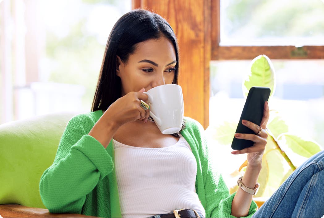 woman scrolling through phone