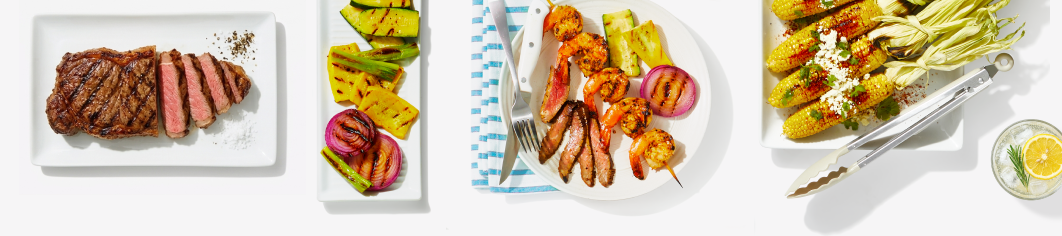Steak, veggies, shrimp, corn