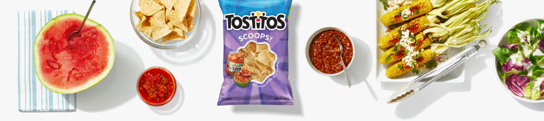 Watermelon, chips, salsa, tortilla chips, corn, baked beans, salad