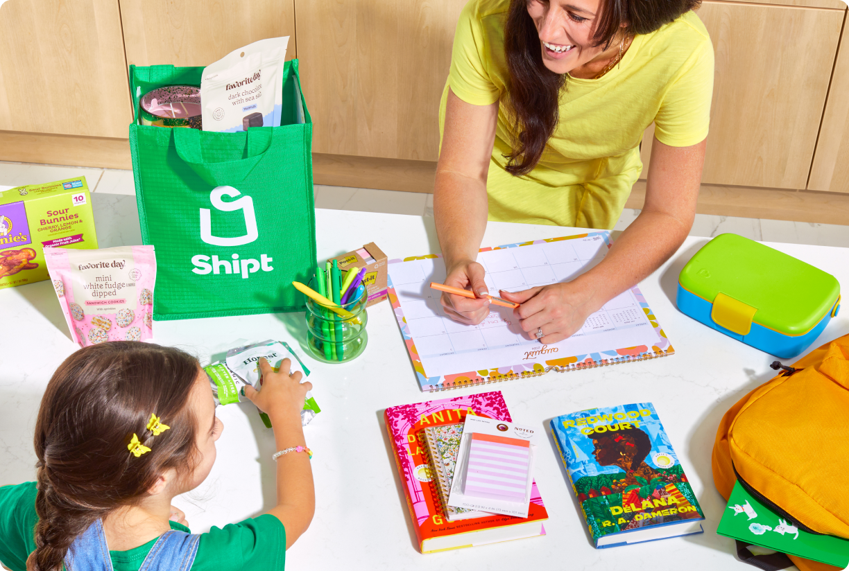Mother and daughter using the school supplies just delivered by Shipt