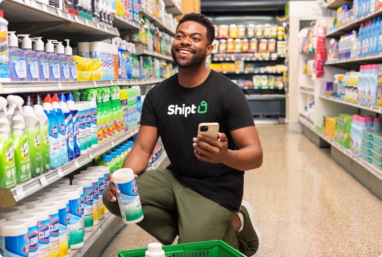 Shopper picking items from the shelf