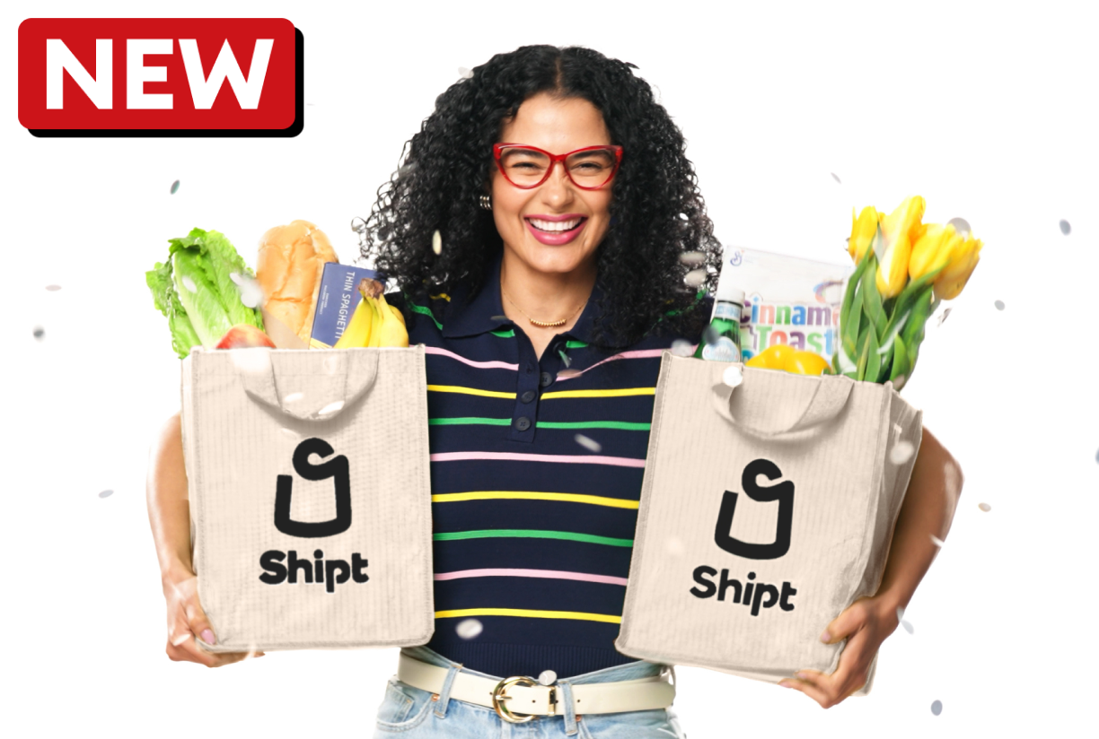 Woman holding a bag of groceries