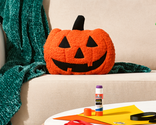 Indoor Halloween decorations including a soft pumpkin