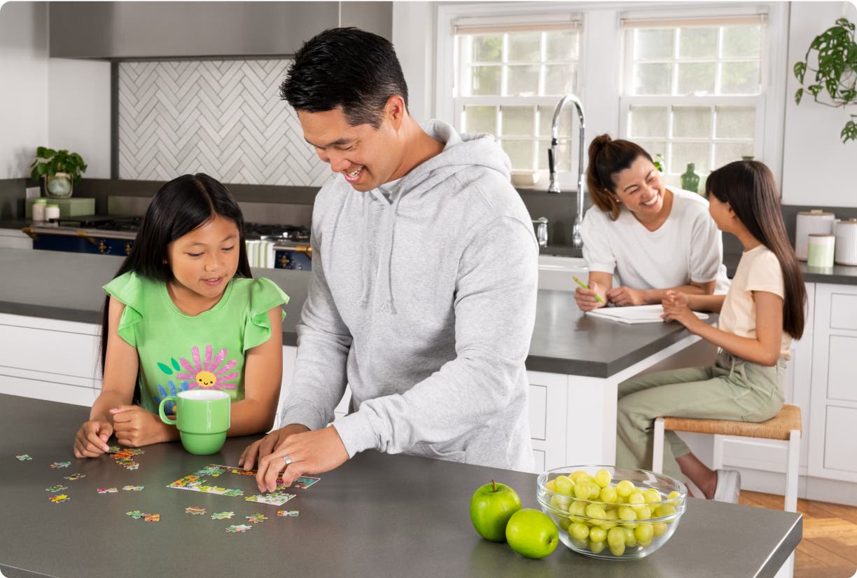 Family gathered in the kitchen