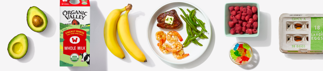 avocado, milk, banana, plated steak, shrimp, and green beans, berries, gummy worms, and eggs