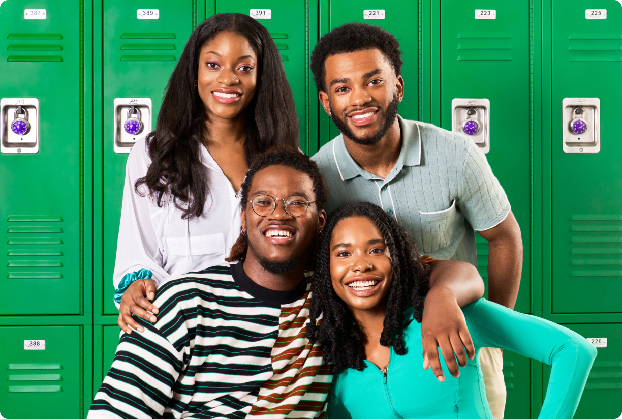 Interns in front of lockers