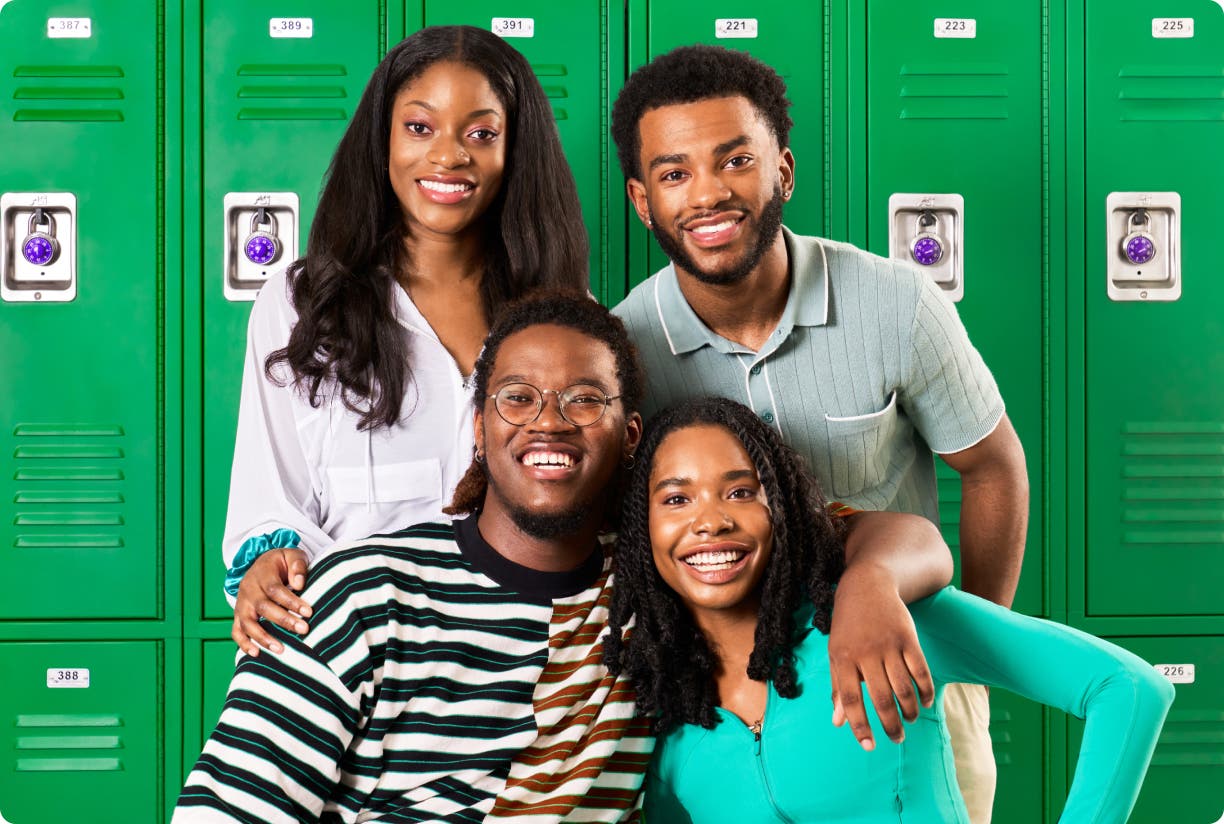 Interns in front of lockers