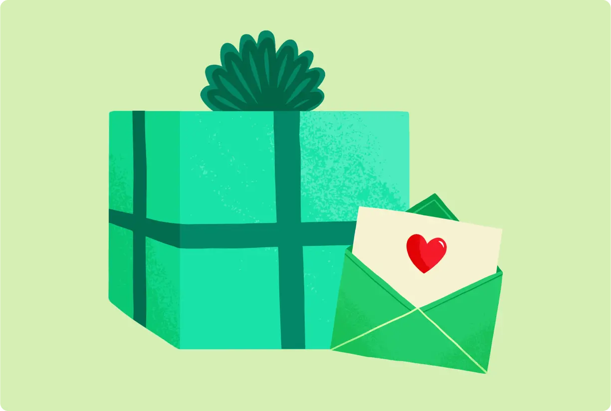 A green gift box with a card