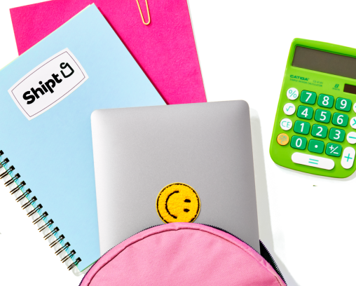 School backpack with a computer and calculator