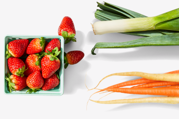 radishes, strawberries, leeks, carrots, apple