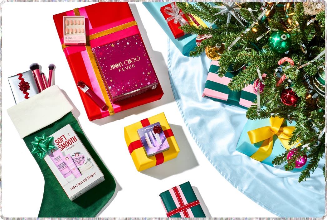 present and a stocking under a Christmas tree