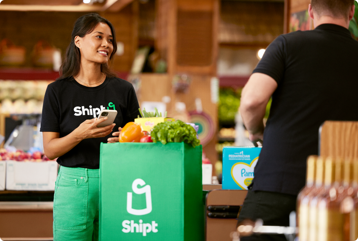 Shopper checking out at grocery store