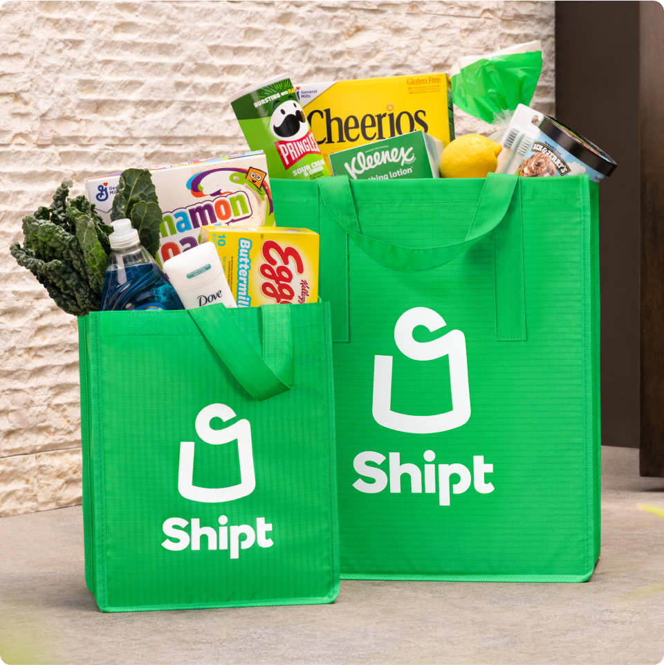 2 bags of Shipt groceries on a door step