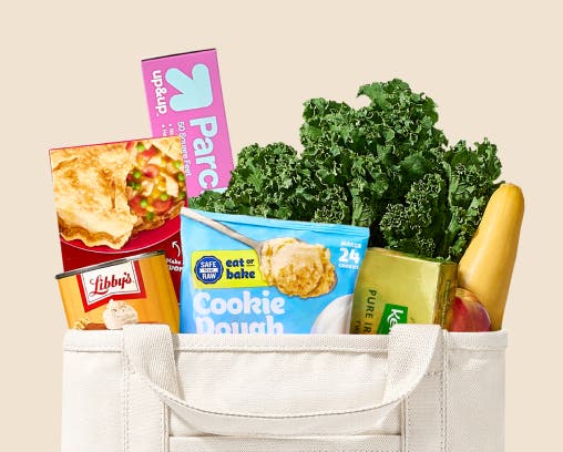 Illustration of groceries in a Shipt-branded bag