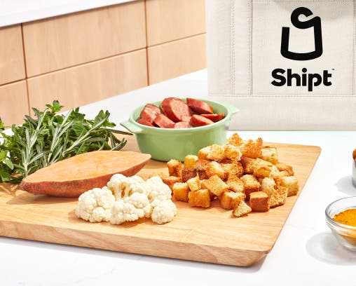 Illustration of groceries in a Shipt-branded bag