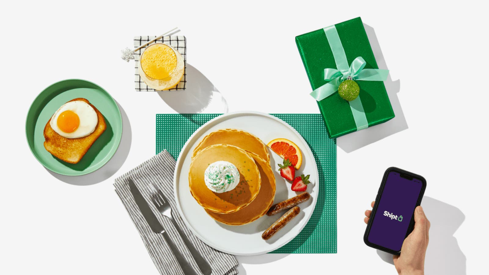 breakfast table display with shipt app in hand