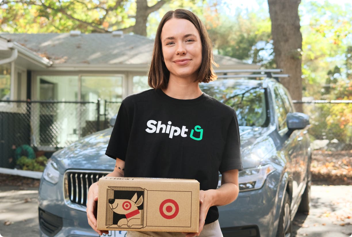 Shipt package delivery person at front doorstep with Target delivery box